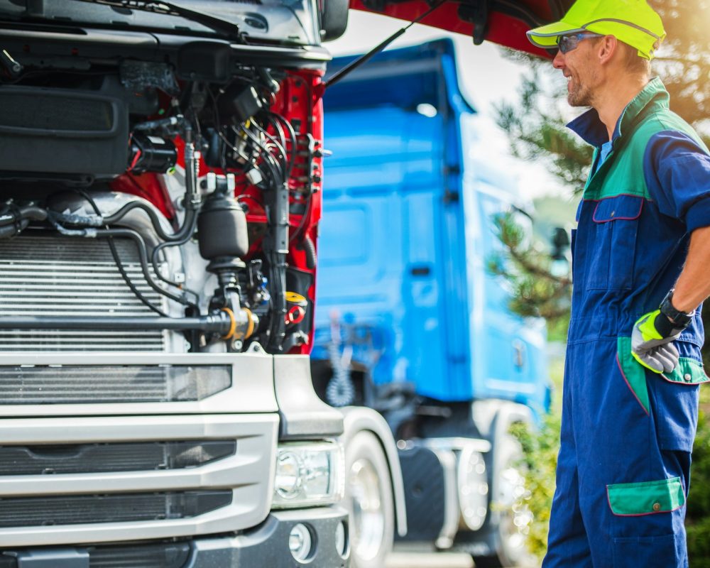 Happy Smiling Professional Truck Mechanic
